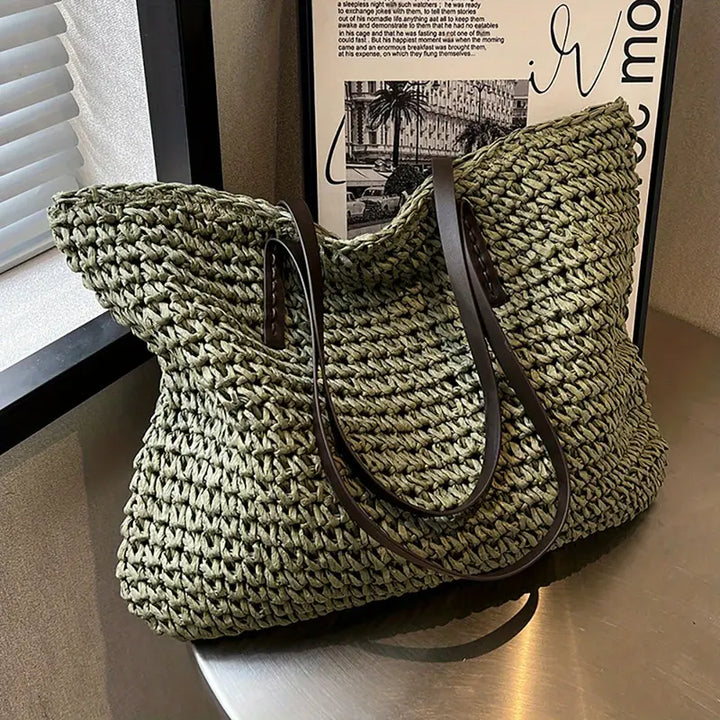 Woven carrier bag with leather straps