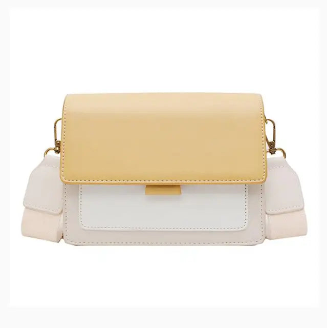 Ladies' crossbody bag in yellow leather with soft texture and flap fastening