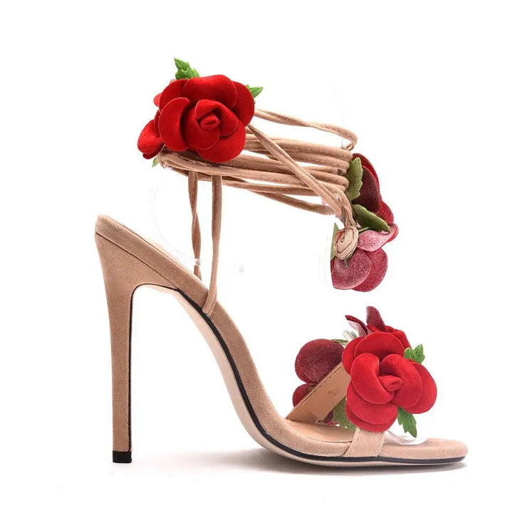 Stiletto sandals with floral appliqués