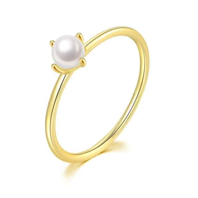 Minimalist gold ring with solitaire pearl