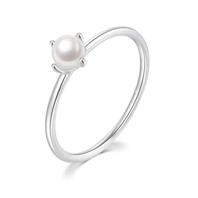 Minimalist gold ring with solitaire pearl