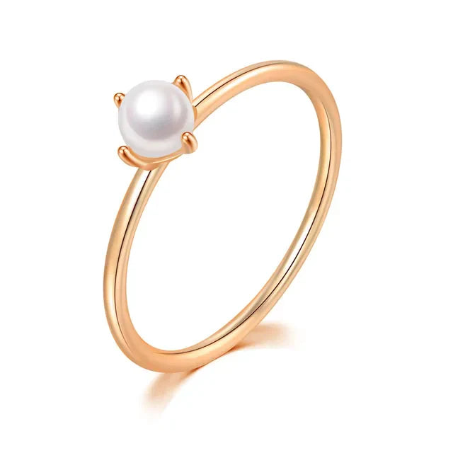 Minimalist gold ring with solitaire pearl
