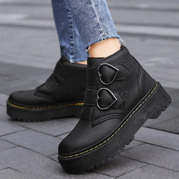 Fashionable ankle boots with heart-shaped buckles