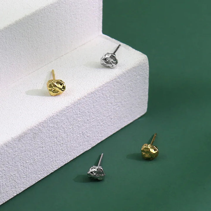 Moulded gold stud earrings