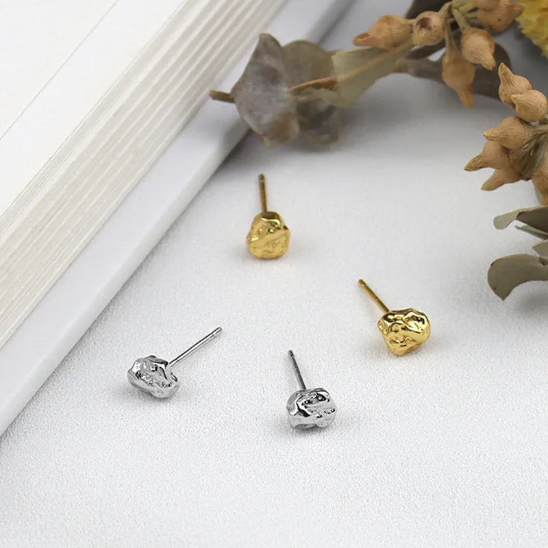 Moulded gold stud earrings