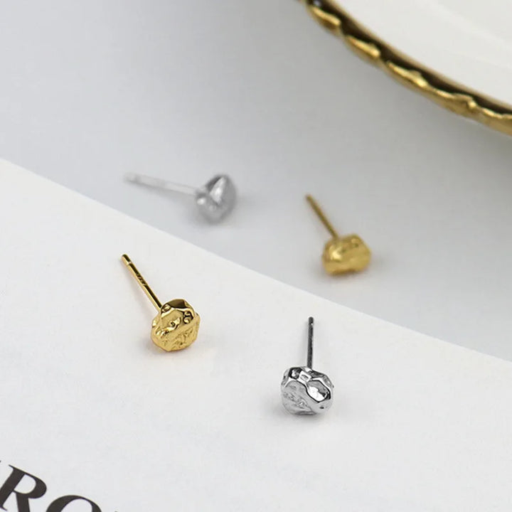 Moulded gold stud earrings