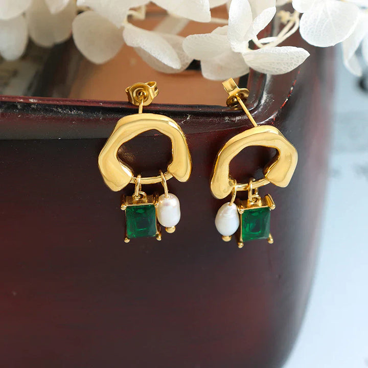 Geometric emerald earrings with pearl detail