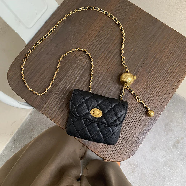 Quilted mini shoulder bag with chain strap