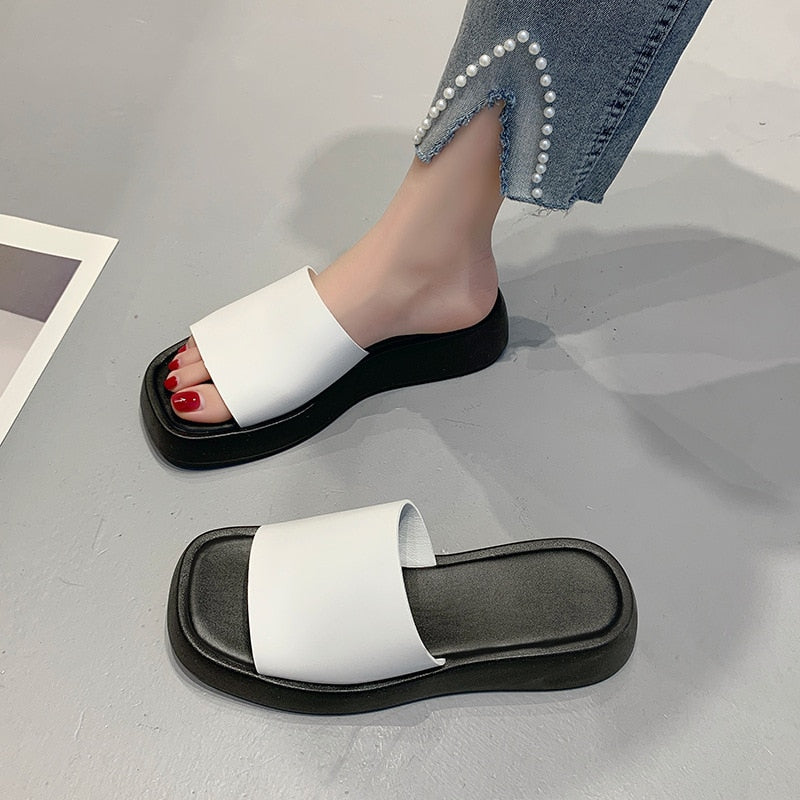 Minimalist slide sandals with wide strap