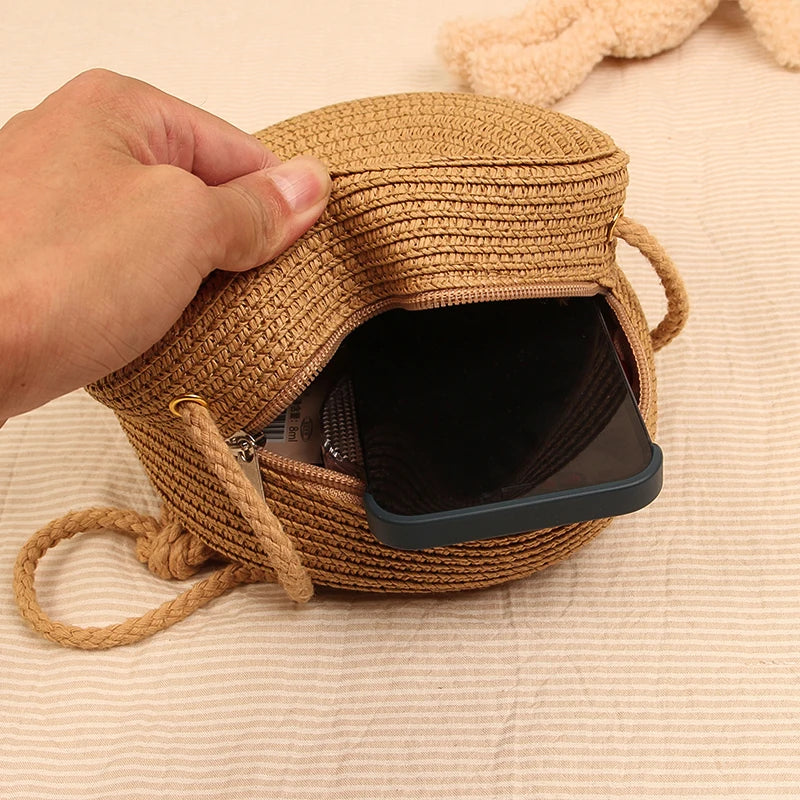 Ladies straw round shoulder bag hand-woven with zip fastening