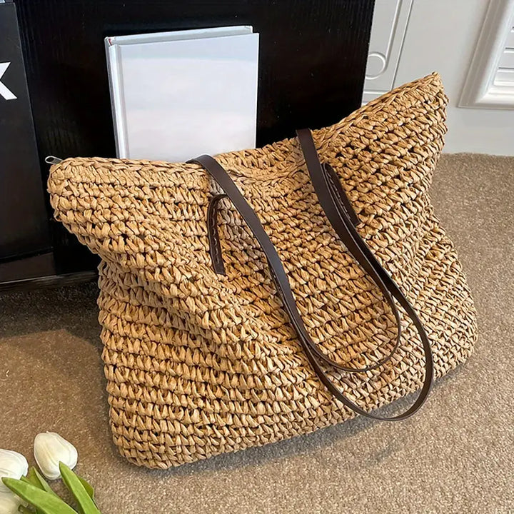 Woven carrier bag with leather straps